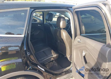 2016 Ford Escape Titanium z USA, uszkodzony, nr VIN 1FMCU9J97GUA77921